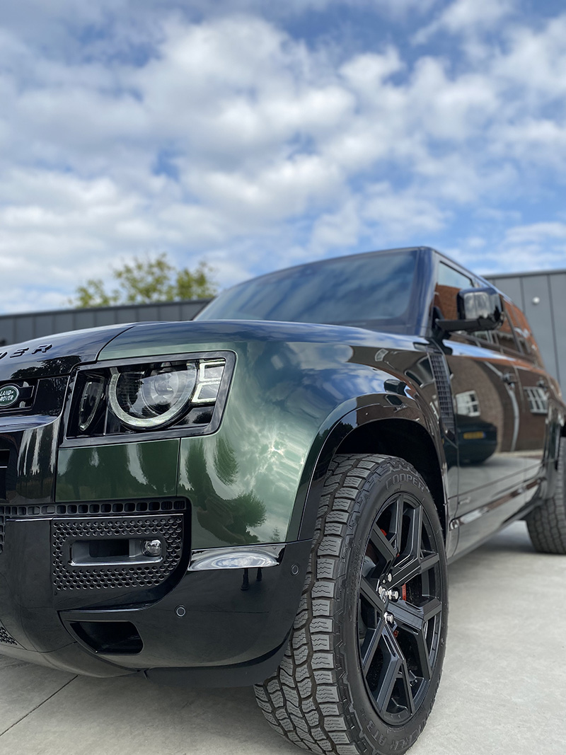 land rover defender 110 metallic midnight green inozetek carwrap